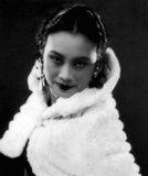Hu Die (1907-1989) had a career as a film actress from the late 1920s to the 1960s.<br/><br/>

She had her most brilliant period in the 1930s and the 1940s. Early in the 1930s, she played the leading role in China's first sound film, The Singsong Girl, in which she portrays a kindhearted but somewhat ignorant woman who endures her husband's mistreatment and oppression without the slightest resistance.<br/><br/>

In The River Flows Rampant, the first film made by the left-wing dramatists, she plays the role of Xiujuan, a woman who is filled with the spirit of resistance and has a rich inner world in her heart. Her performance won favorable comments. Hu Die played a full spectrum of characters, including a maidservant, a loving mother, a woman school teacher, an actress, a prostitute, a dancing girl, the daughter of a rich family, a laboring woman, and a factory worker.<br/><br/>

 She had attractive, unconventional qualities, and her performances were gentle, honest, refined and sweet. The audiences call her a film queen. Hu Die lived both in the silent and sound film periods, and she was one of the most popular Chinese film actors and actresses in the 1930s and the 1940s.